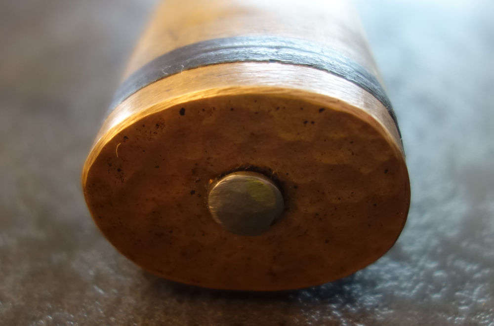 Pommeau bronze martelé sur soie traversante